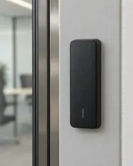 Completed card reader installation beside an office door